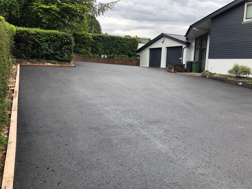 This is a photo of a asphalt driveway which is in the process of being installed by Temora Road Tek